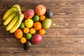 Heart-shaped still life of mixed tropical fruit