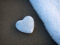 Heart-shaped Cherish Stone On Sand Royalty Free Stock Photo