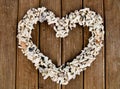 Heart shaped stones on old striped wood planks Royalty Free Stock Photo