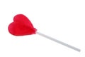Heart shaped strawberry lollipop close up on white background