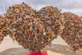 Heart-shaped symbols adorned with padlocks tell tales of enduring love.