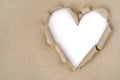 Heart shaped torn through recycled paper Royalty Free Stock Photo