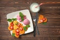 Heart shaped waffles with strawberries, ice cream and glass of milk on wooden table Royalty Free Stock Photo