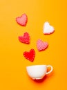 Heart shapes and white cup Royalty Free Stock Photo