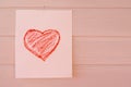 Heart on a sheet of paper drawn by a child Royalty Free Stock Photo