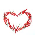 heart sign of red chili peppers on a white background. blank for designers. Royalty Free Stock Photo