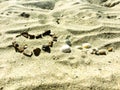 Heart sign on a sand made of stones Royalty Free Stock Photo