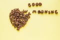 Heart sign on the table and the inscription Good morning, made of dry Breakfast - chocolate flakes in form of letters of alphabet