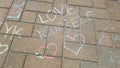 Heart sketches with the text love yourself - chalk drawing on stone pavement Royalty Free Stock Photo