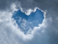 Heart in the sky, hole in the cloud in the shape of a heart