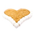 Heart from slices of white refined sugar and brown sugar Royalty Free Stock Photo