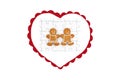 Heart with smiling gingerbread man and woman on completed white jigsaw puzzle, isolated on white background, copy space Royalty Free Stock Photo