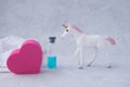 Heart stimulating drink, unicorn white lingerie and flower Royalty Free Stock Photo