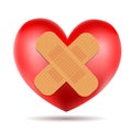 Heart symbol with adhesive bandage