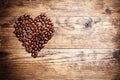 Heart symbol from coffee beans. Royalty Free Stock Photo