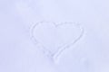 Heart symbol drawing in snow