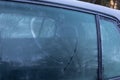 heart symbol on frozen grey car window in winter Royalty Free Stock Photo