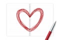 Heart symbol hand drawing by pen sketch red color with notebook, valentine concept design Royalty Free Stock Photo