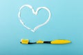Heart symbol made from toothpaste. Royalty Free Stock Photo