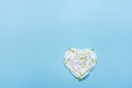 Heart Symbol Made from White Flower Petals on Blue Background. Valentine Mother`s Day Romantic Love Purity
