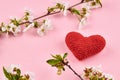 heart symbol. romance and love concept. pink background with spring flowers decoration