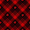 Heart tartan check plaid pattern in red and black for Valentine`s Day flannel shirt, skirt, blanket, scarf. Seamless texture. Royalty Free Stock Photo