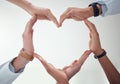 Heart, teamwork or hands of doctors with support in collaboration for healthcare wellness together. Closeup, love shape Royalty Free Stock Photo