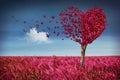 Heart tree with butterflies and meadow