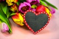 Heart with tulips, pink background, easter, motherÃÂ´s day Royalty Free Stock Photo