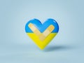 Heart with ukrainian flag and band-aids for wounds Royalty Free Stock Photo