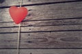 Heart on wooden background