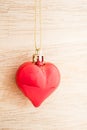 Heart on wooden background