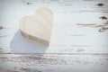 Heart wooden box on white wood