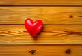 Heart on a wooden table. Valentines Day greeting card