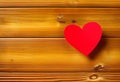 Heart on a wooden table. Valentines Day greeting card