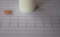 Heartbeat represented on paper. Electrocardiogram with selective focus. Representation of cardiac arrhythmias