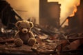 Heartbreaking Concept - sad teddy bear in ruins of house destroyed at war Royalty Free Stock Photo