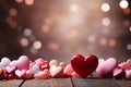 Heartfelt decor, pink and red hearts on a wooden tabletop