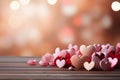 Heartfelt decor, pink and red hearts on a wooden tabletop