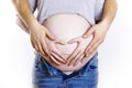 Hearth shape on pregnant belly Royalty Free Stock Photo