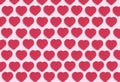 Hearts background. Colored ornament pattern from cut out red hearts on a pink background. Love, romance, wallpaper, postcard
