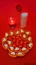 Hearts chocolates cookies red rose candle. Royalty Free Stock Photo