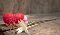 Hearts and flowers on the wooden table