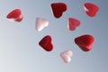 hearts flying in the sky, voluminous, translucent hearts in pink tones on a blue background, in blur