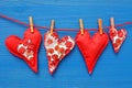 Hearts hanging on line