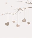 Hearts hanging on a tree branch