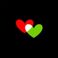 Hearts icon green and red on black Royalty Free Stock Photo