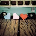 Hearts with part of vintage blue van background on old wooden ta Royalty Free Stock Photo