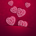 Hearts with a pattern on a crimson background