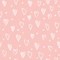 Hand-drawn doodle seamless pattern with hearts and dots.
